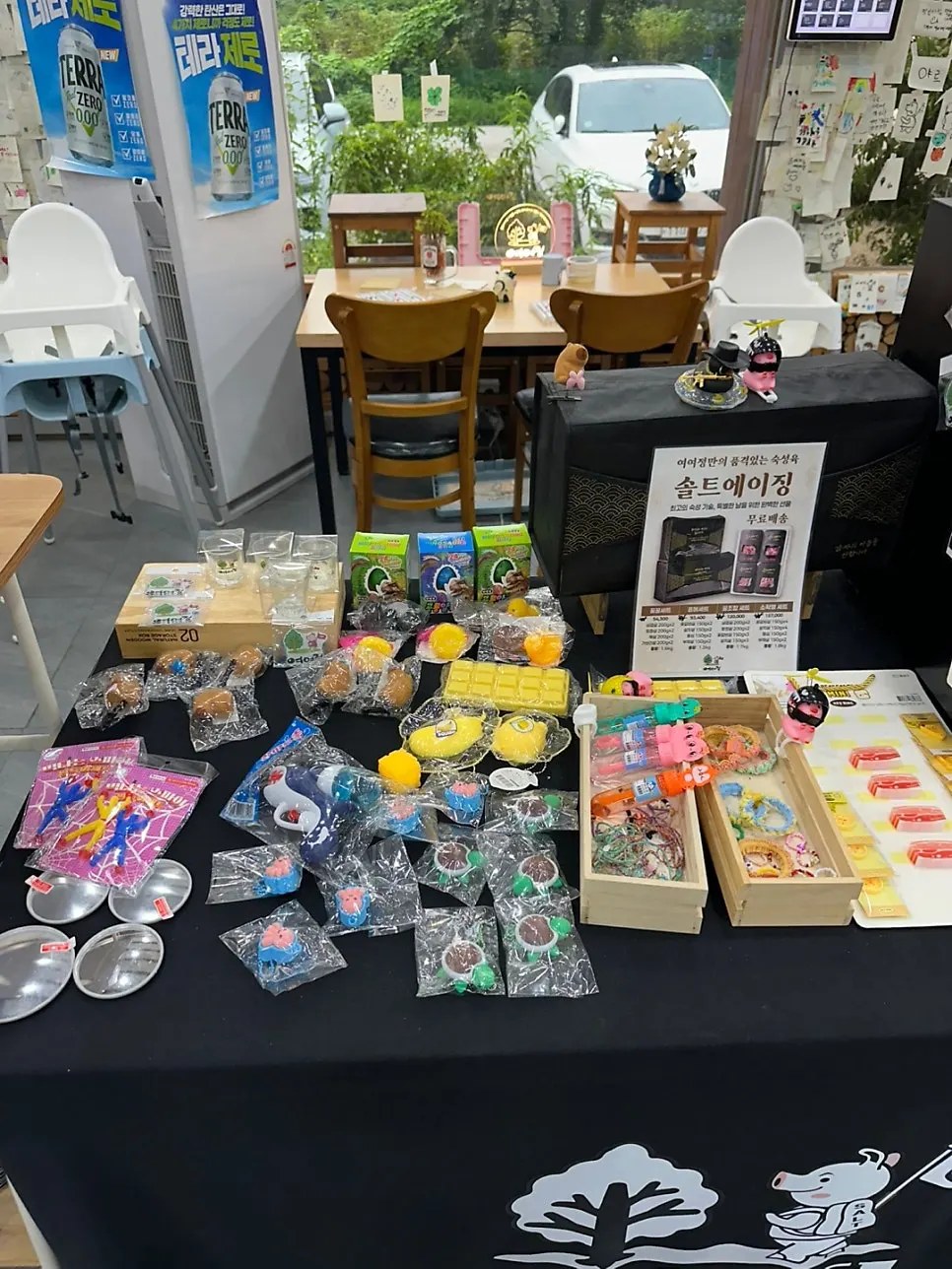 Various draw prizes including toys and drinks