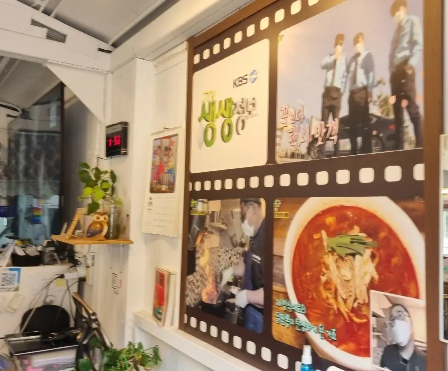 TV appearance notice posted inside the restaurant