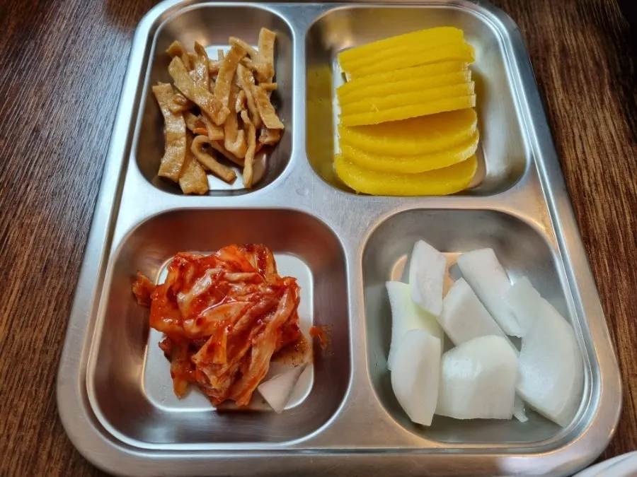 Fishcake and kimchi served as the basic side dishes