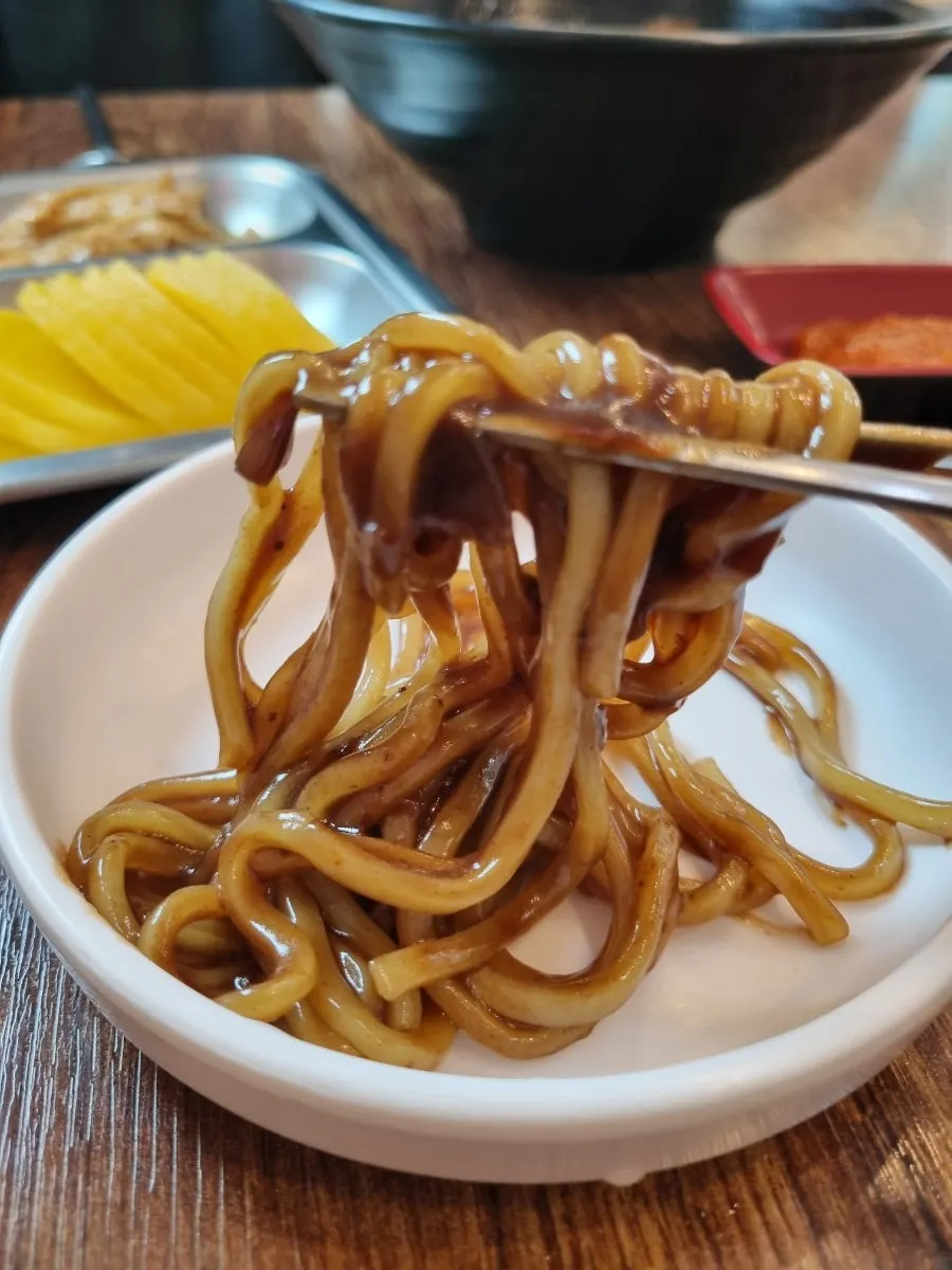 Close-up of noodles mixed with jajang sauce