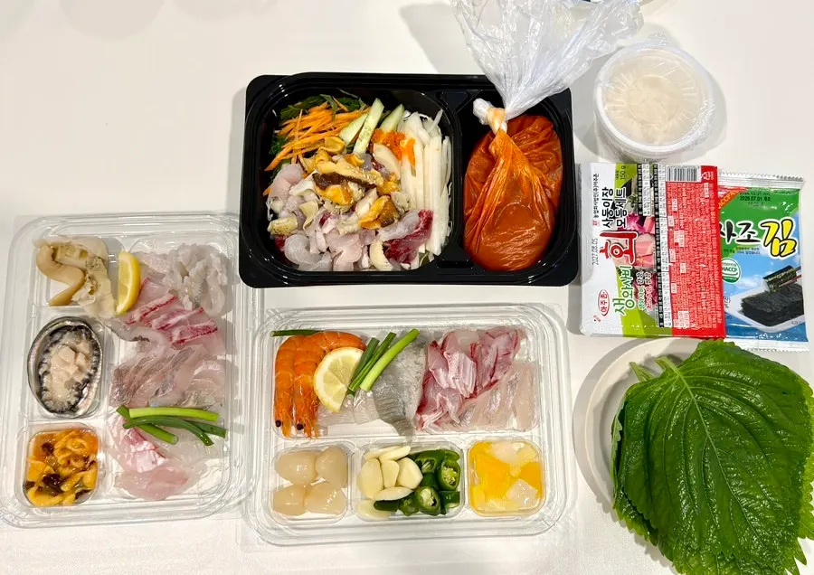 Assorted sashimi for two laid out at the accommodation