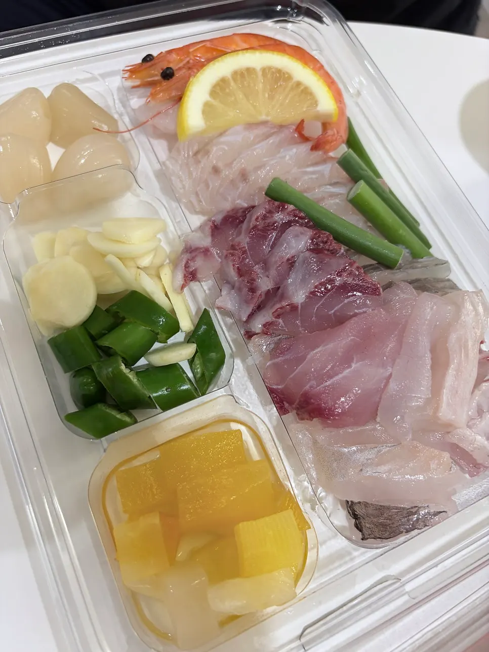 Assorted sashimi served with seafood