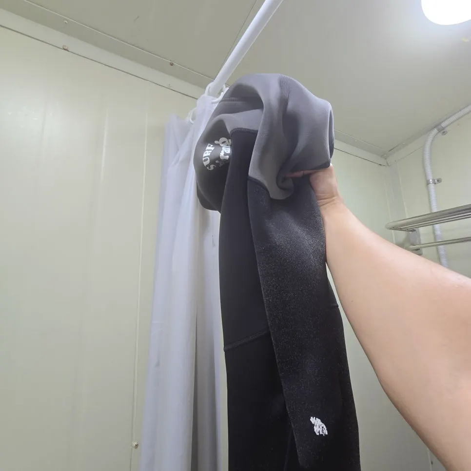 Interior of the changing room doubling as a shower