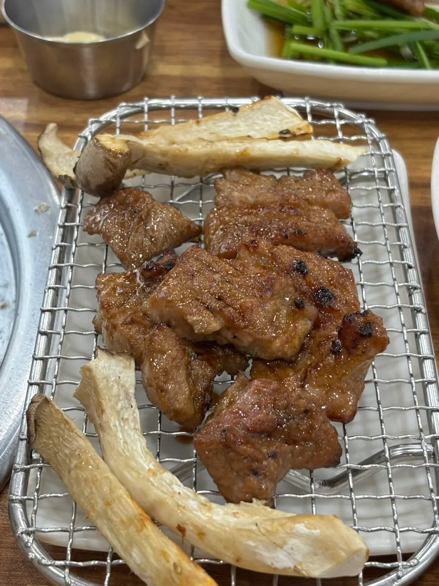A well-grilled piece of marinated rib