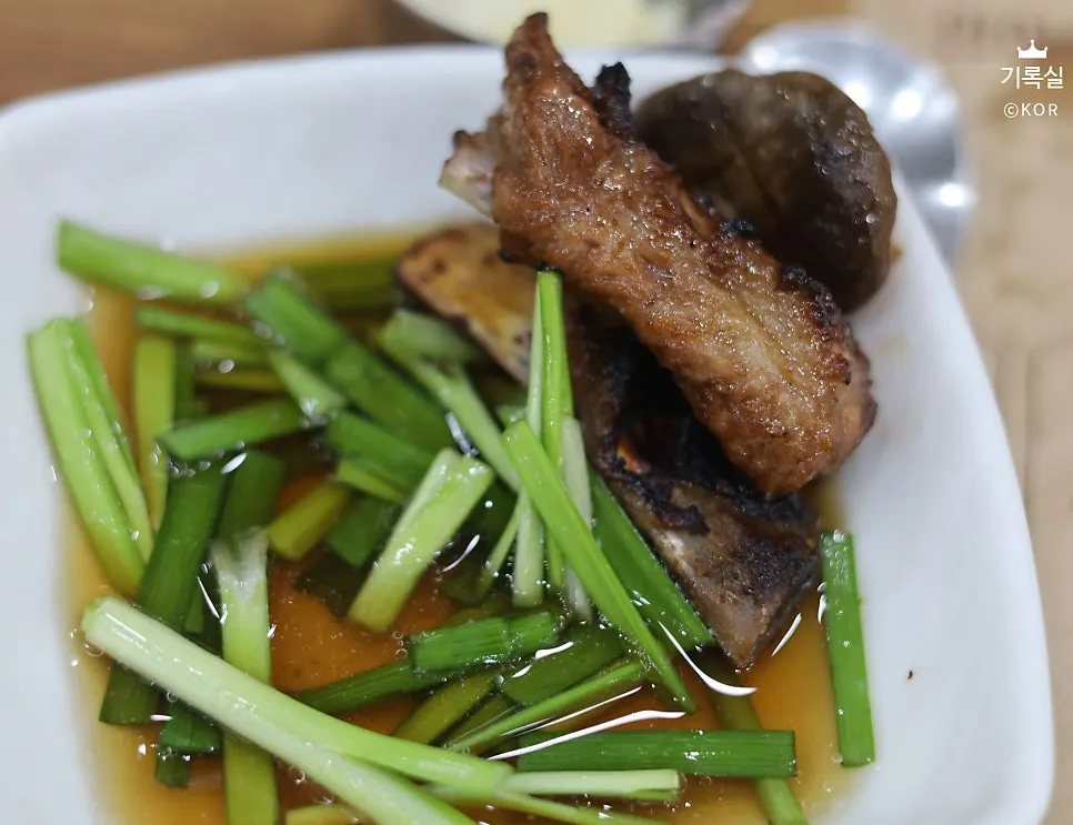 Marinated pork galbi cooking on the grill