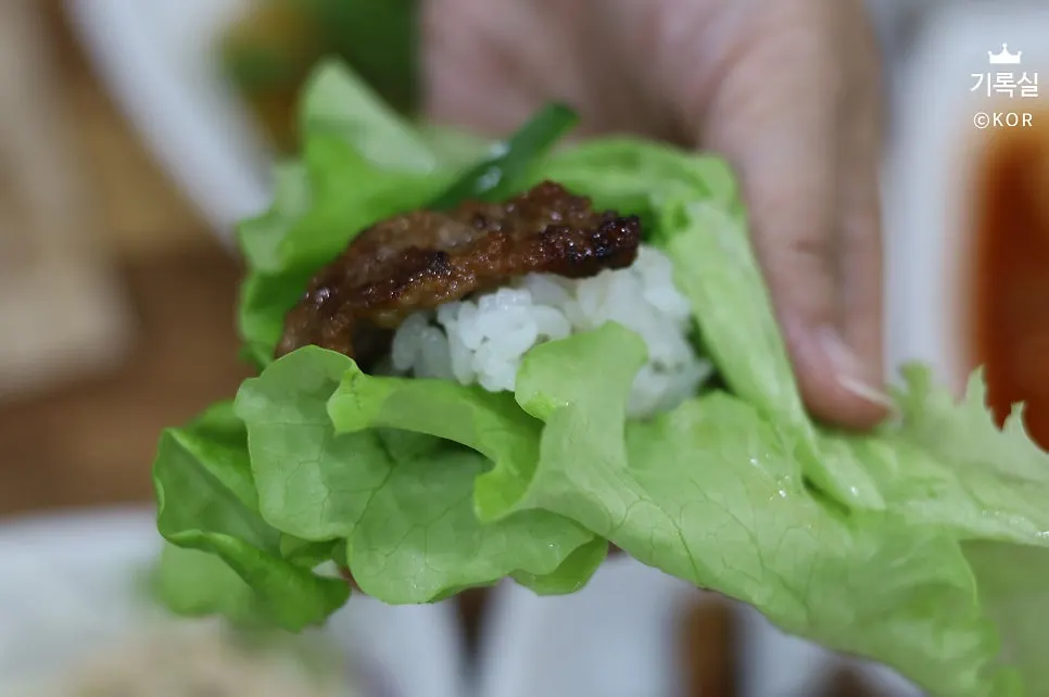 A cooked piece of marinated pork galbi
