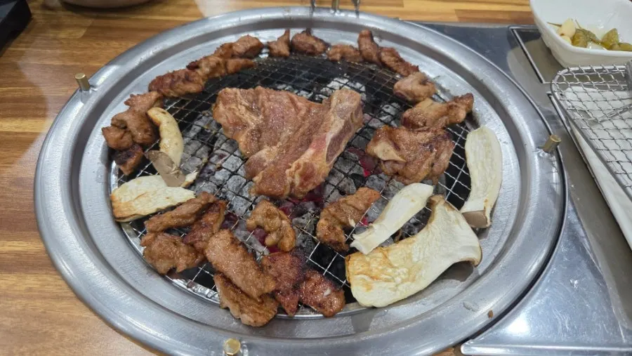 Full spread of ordered marinated galbi and side dishes