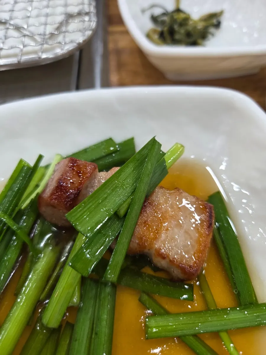 Grilled pork jowl with smoky charcoal aroma