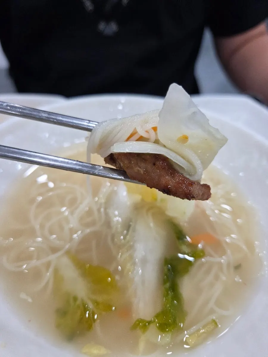 Finishing the meal with dongchimi broth and white kimchi noodles