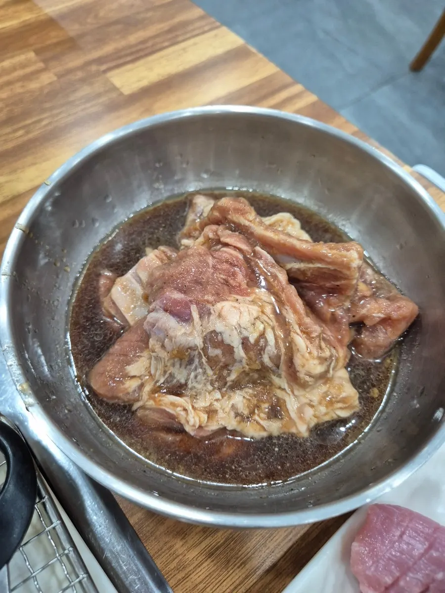 Marinated galbi grilling on the tabletop