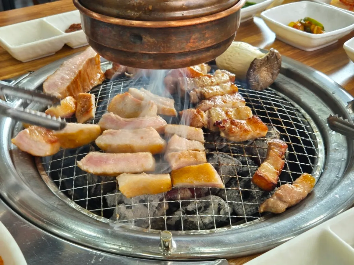 Charcoal-grilled meat at Yeoyejeong, a Yangyang meat restaurant