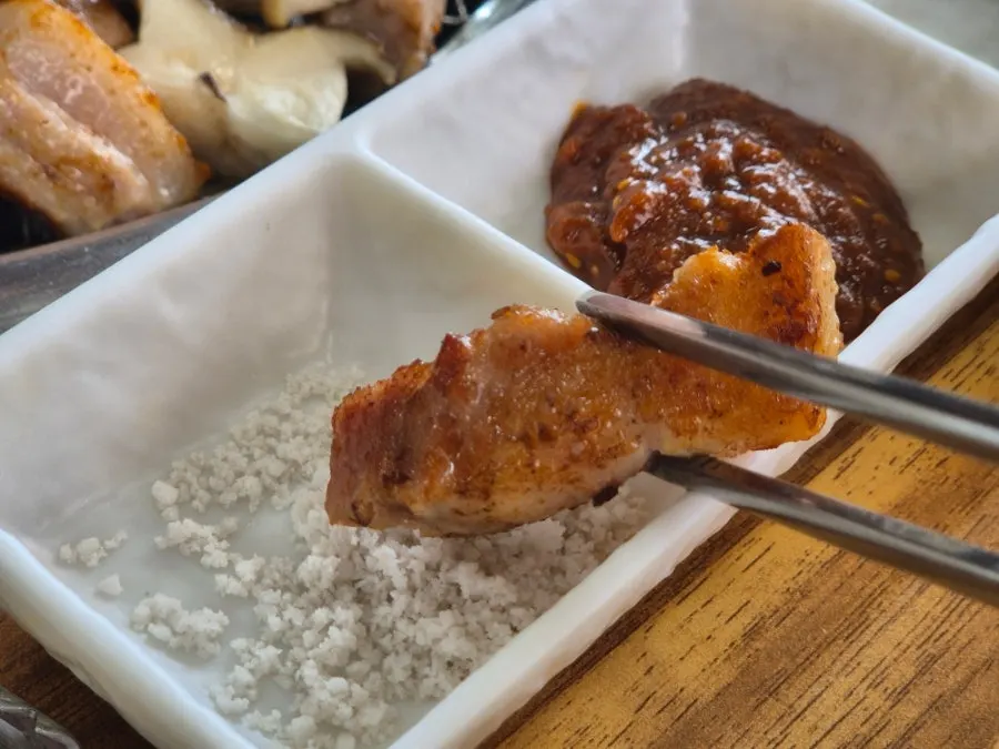 A piece of grilled pork belly