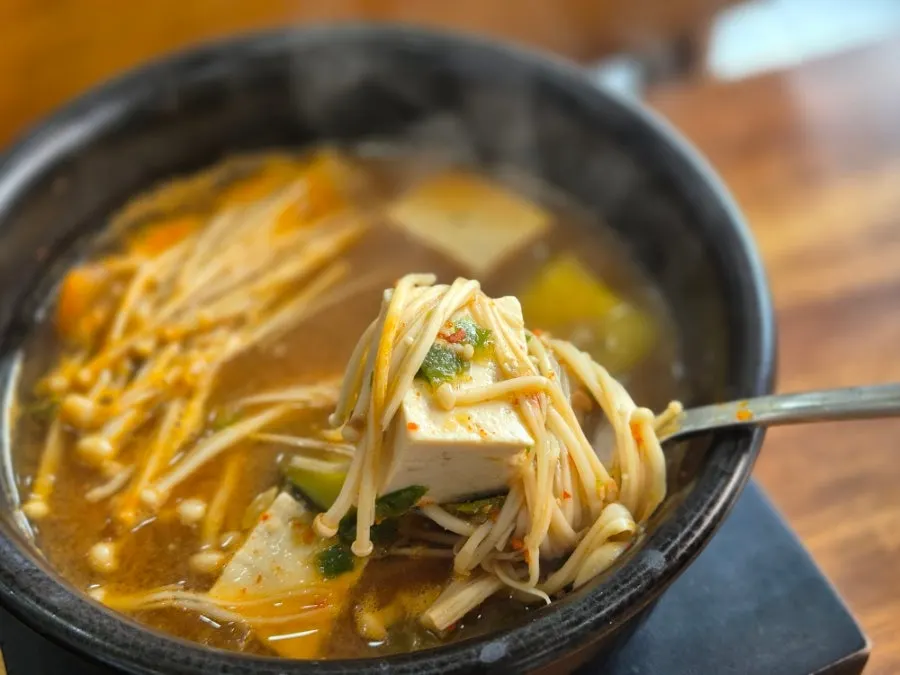 Doenjang jjigae bubbling in a stone pot