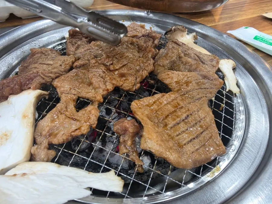 Close-up of marinated ribs grilling