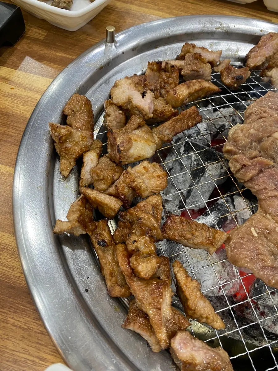 Marinated ribs placed on the charcoal grill