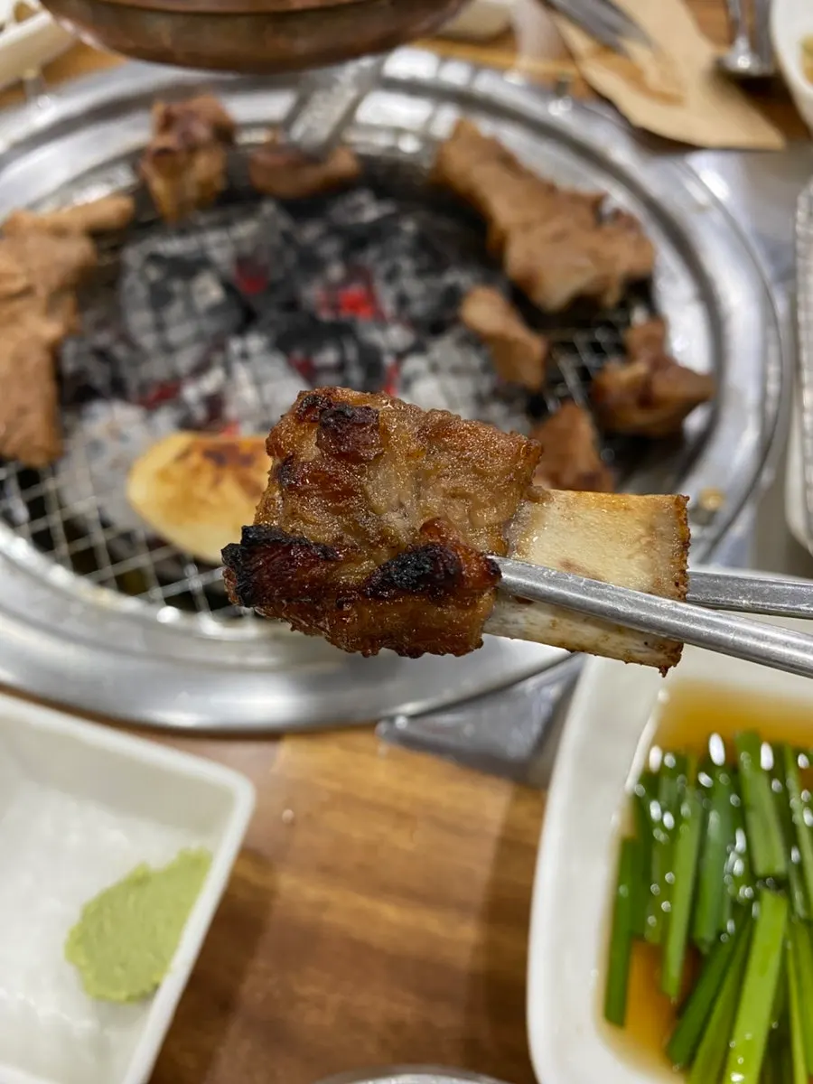 A lettuce wrap with grilled marinated rib