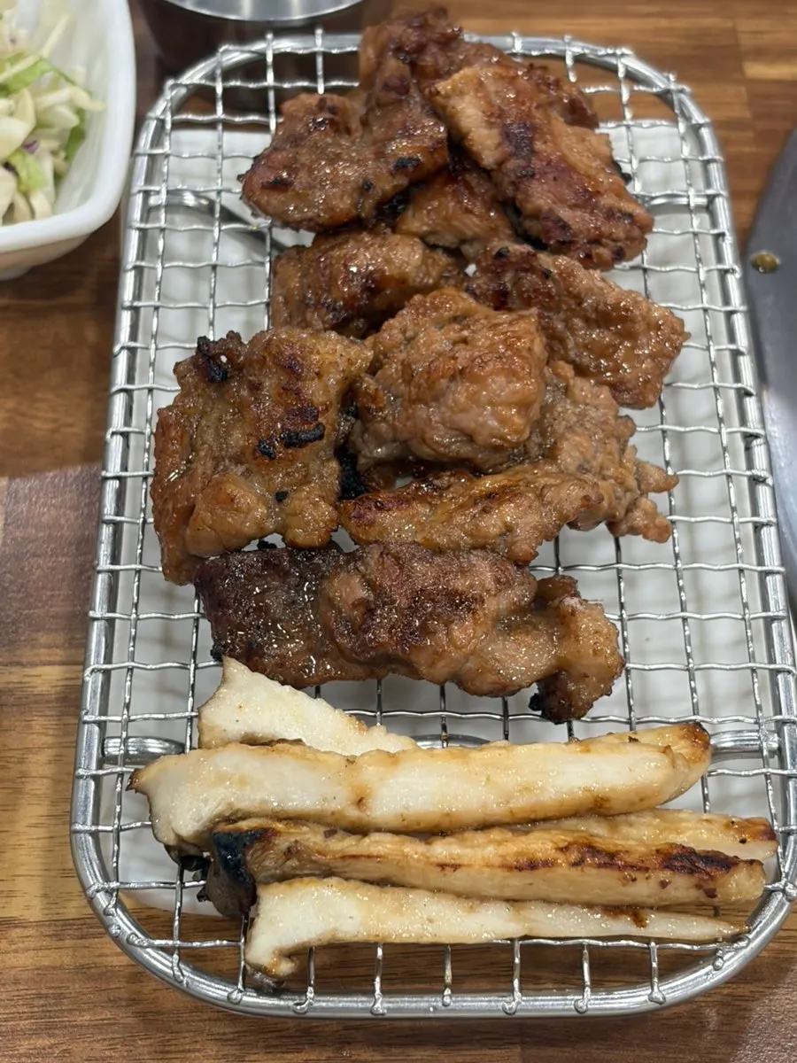 Picking up a piece of marinated rib