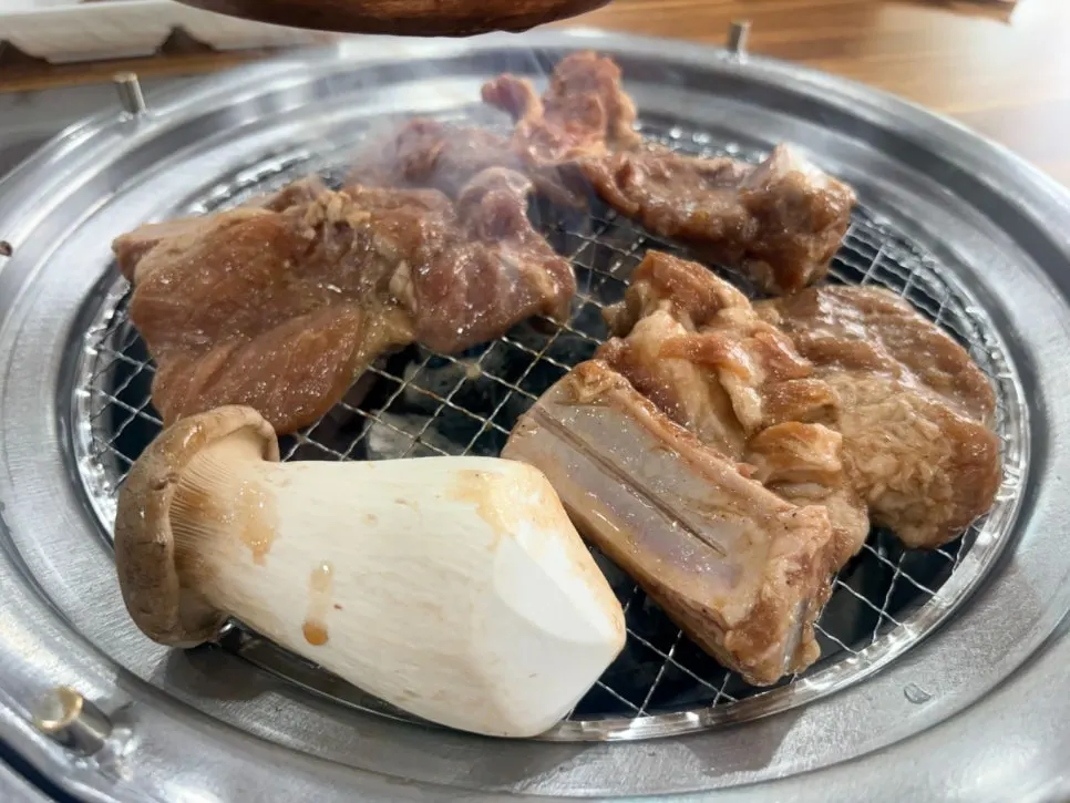 Marinated pork galbi placed on the charcoal grill