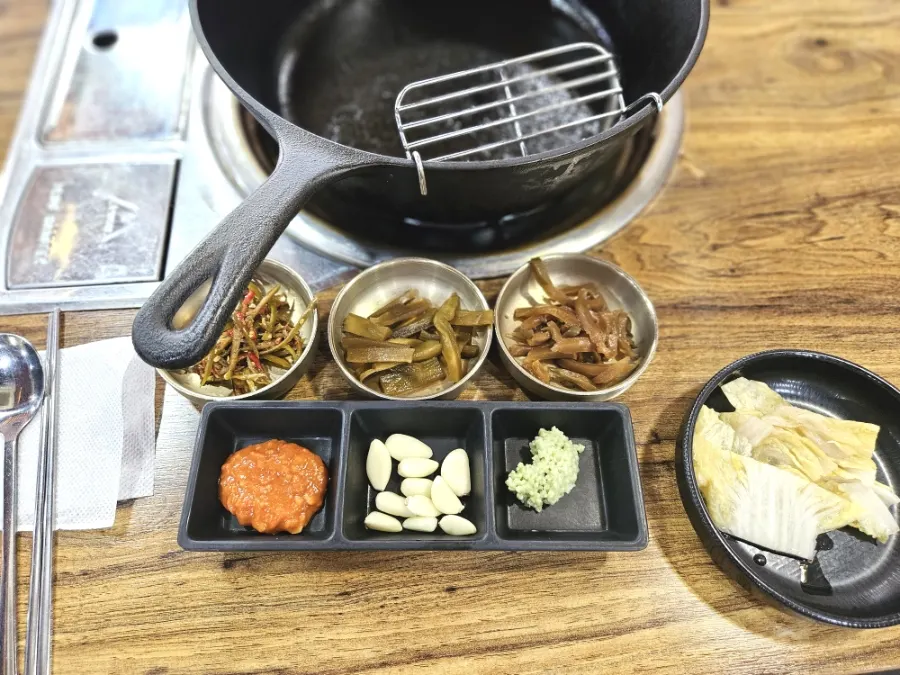 Menu board showing hanwoo sirloin and cabbage soup