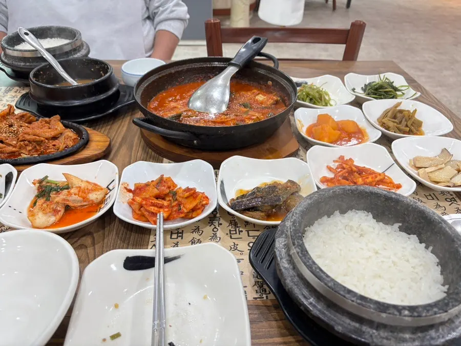 Side dish spread including tangpyeongchae and japchae