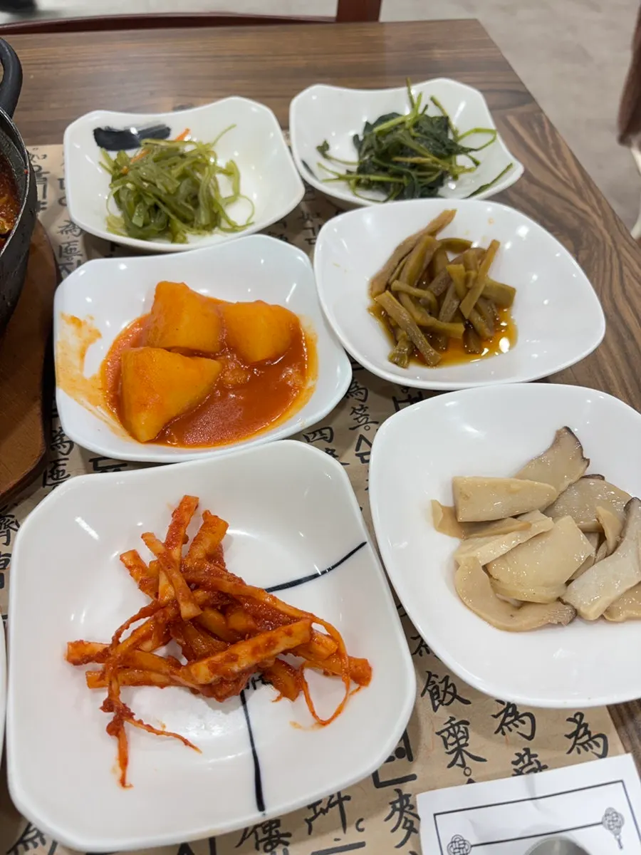 An assortment of mild, non-intense banchan