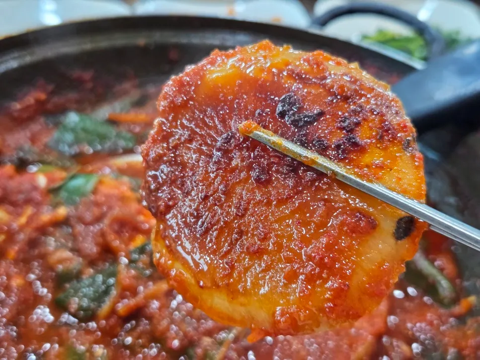 Radish soaked in sauce inside the braised cutlassfish