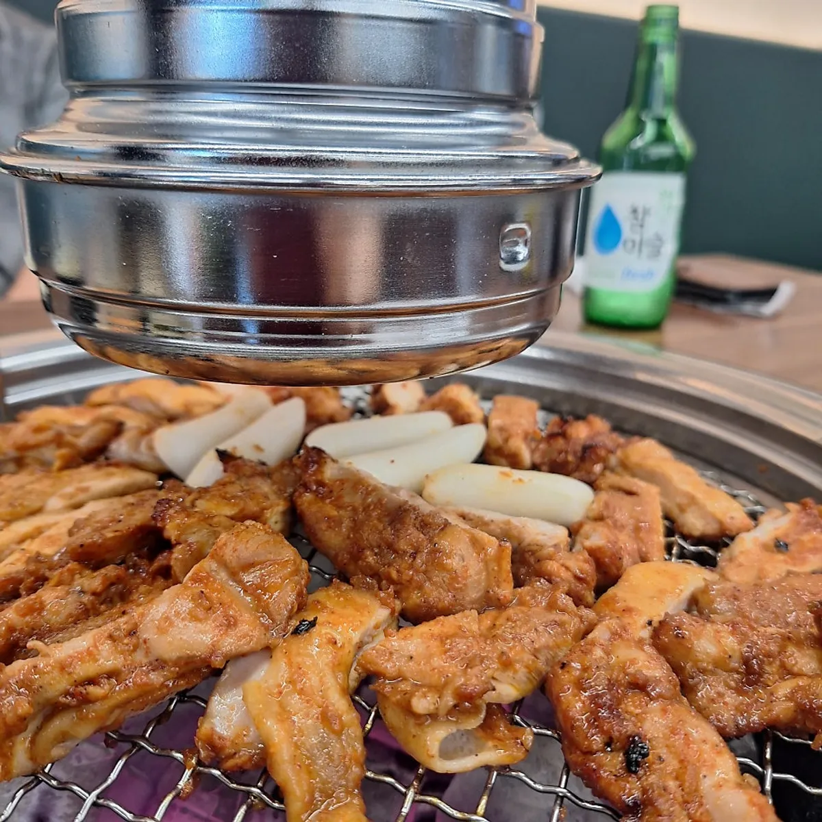 A single serving of charcoal seasoned dakgalbi table setting
