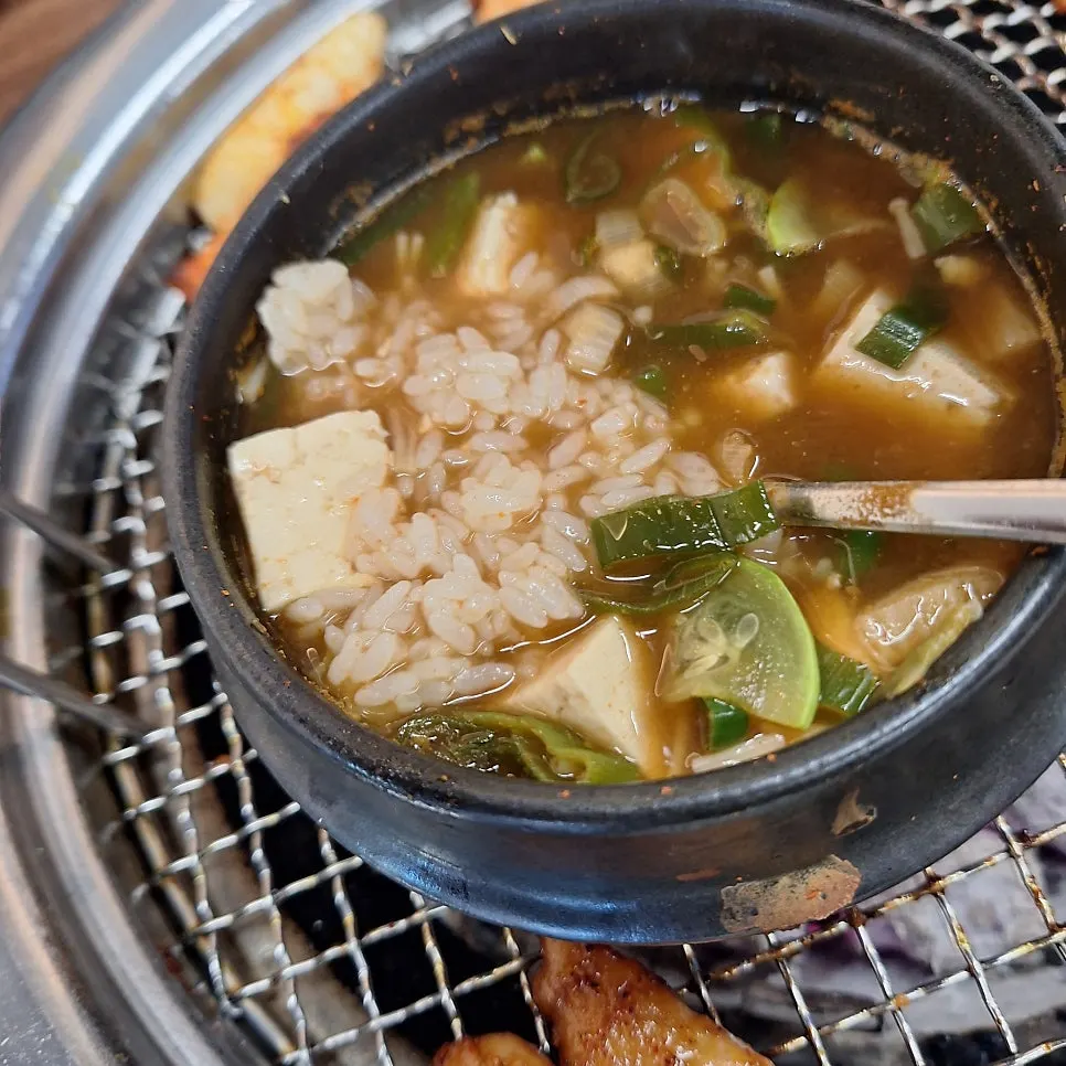 A bottle of soju enjoyed alongside the doenjang jjigae