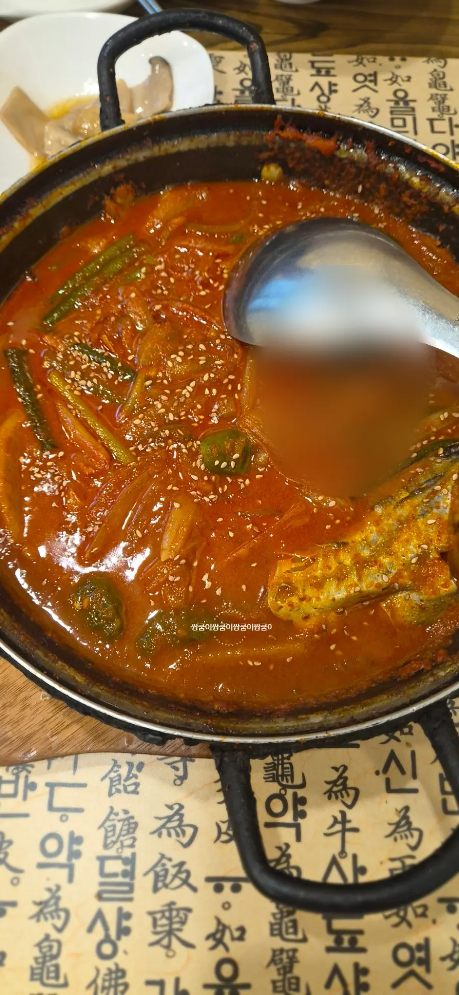 Close-up of sauce-soaked braised cutlassfish