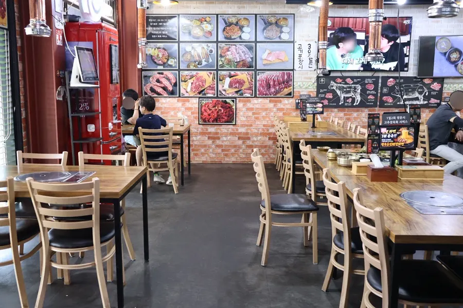 Spacious interior with generously spaced tables