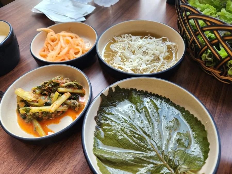 Basic table setup with dongchimi and pickled cabbage