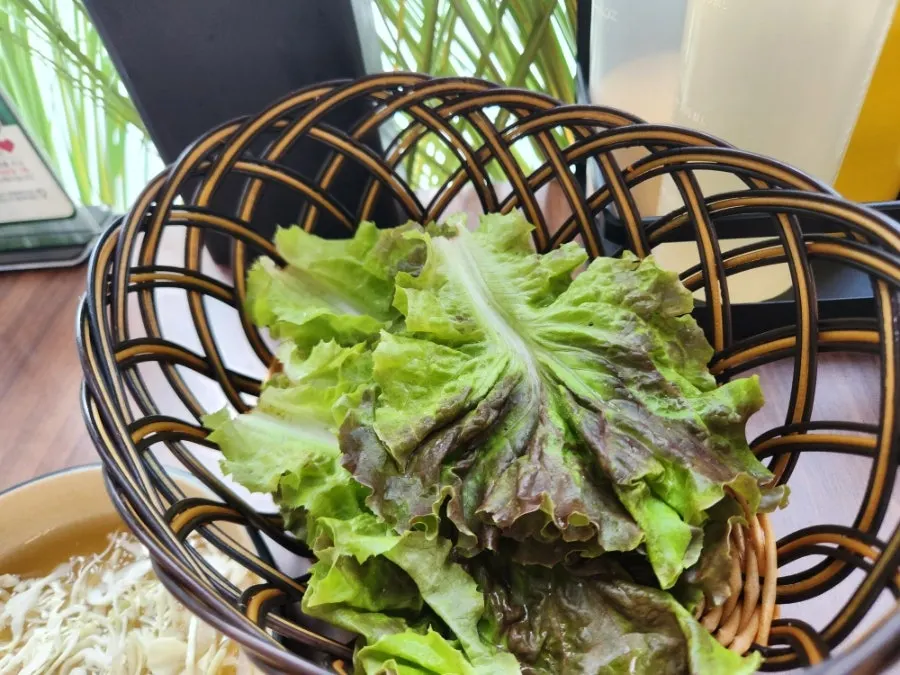 Plate of lettuce and garlic to go with the meat