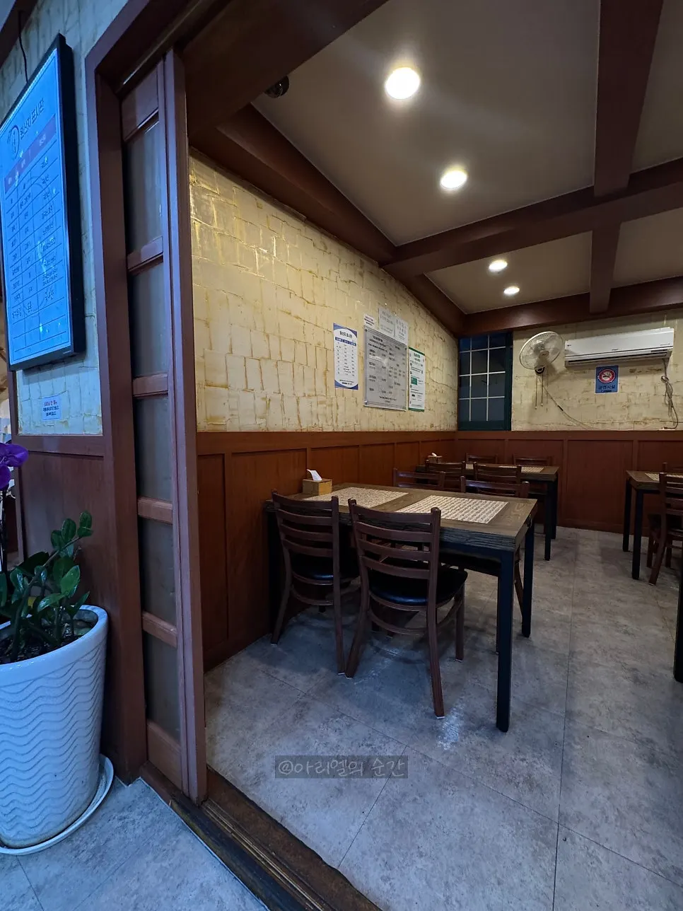 Restaurant interior with wide spacing between tables
