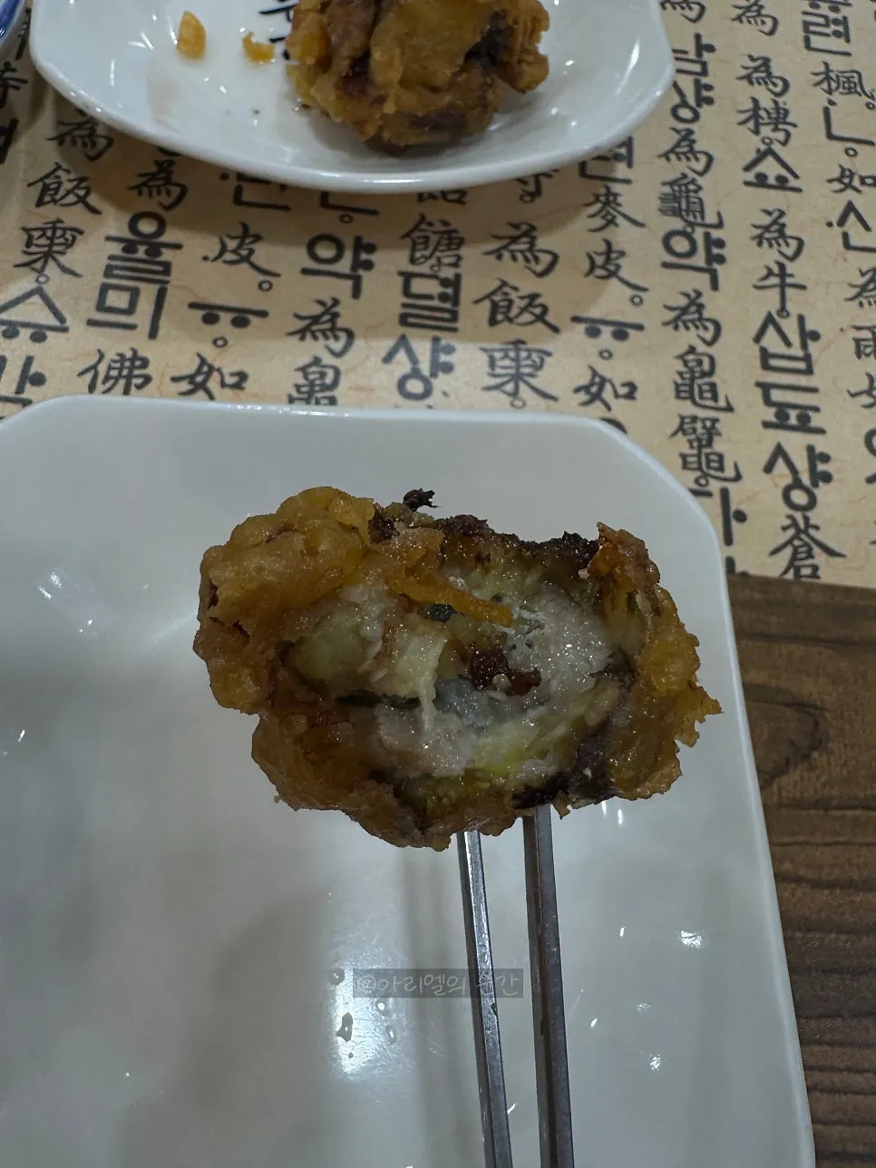 Thick fried eggplant stuffed with meat
