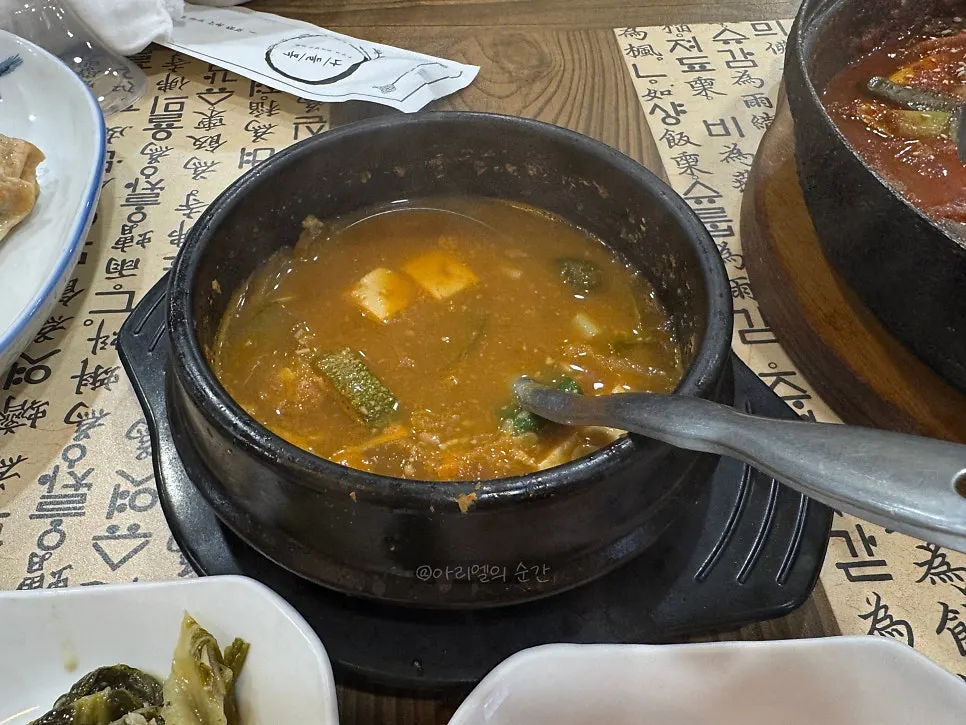 Assorted namul side dishes and pork stir-fry