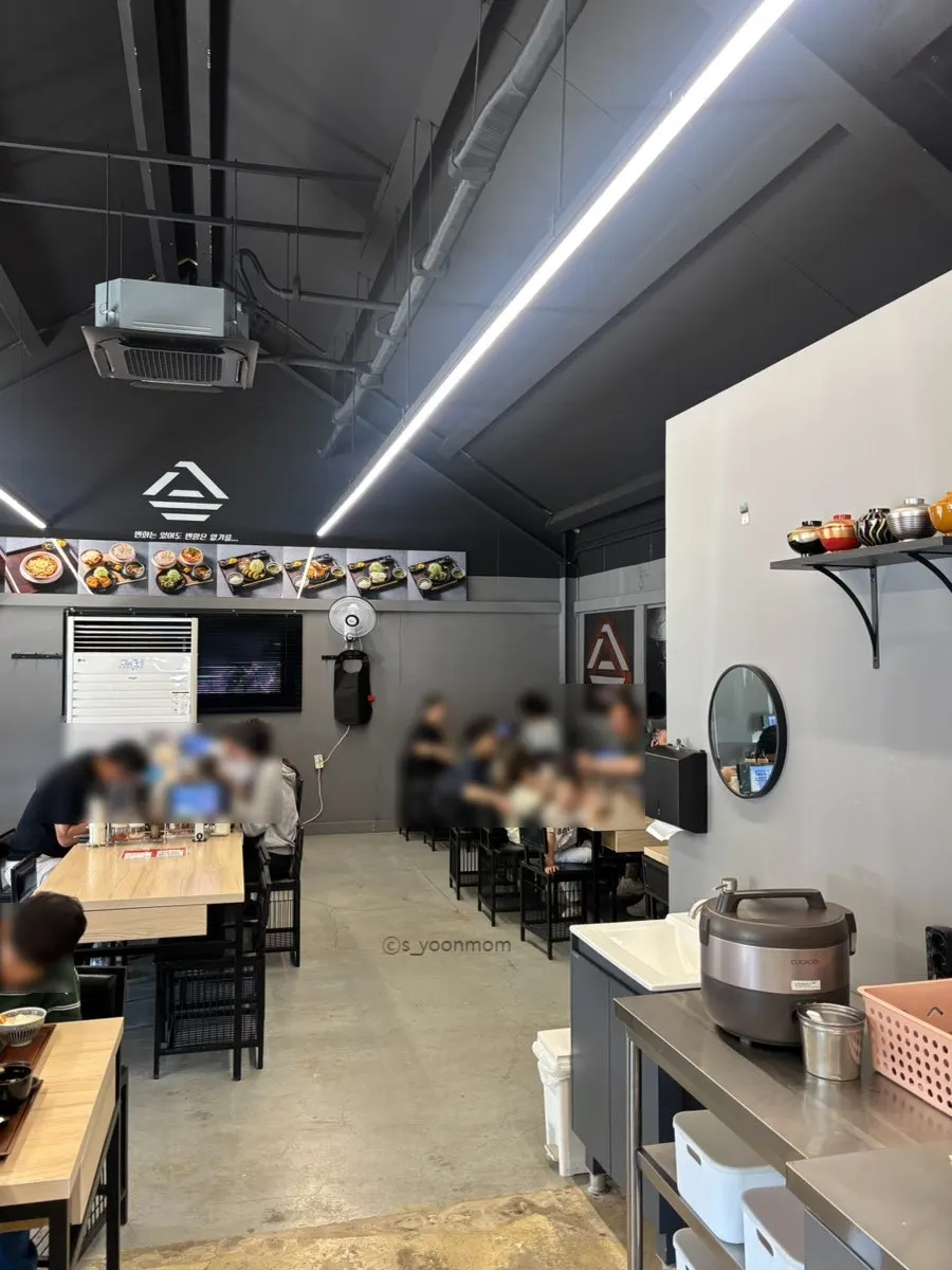 Gyugyu Donkatsu dining hall seating photographed after the crowd thinned out