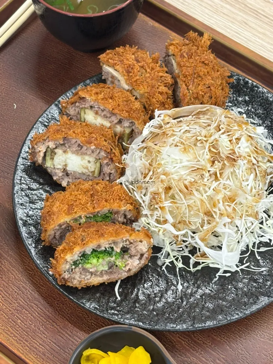 Loin katsu dipped in sesame-ground tonkatsu sauce