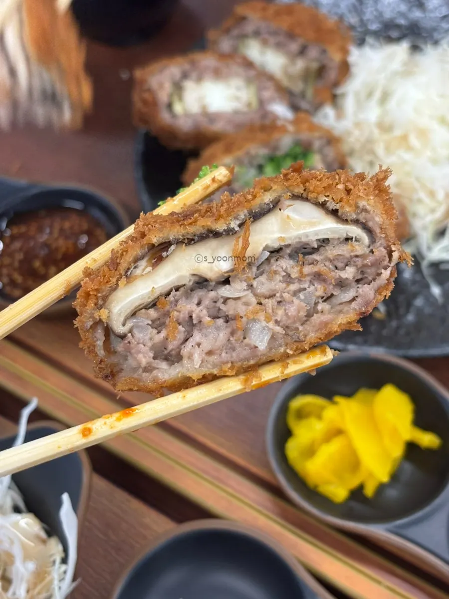 Cross-section of the menchi katsu showing its juices