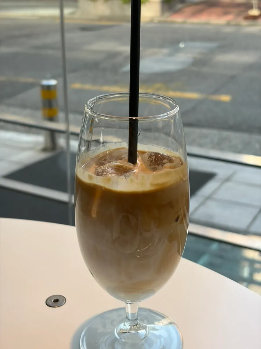 A cup of Mini Male's signature Helsinki latte