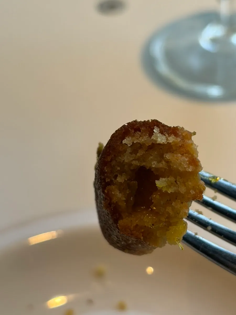 Cross-section of a bite of the apple crumble financier