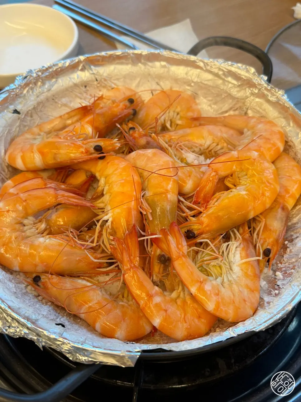 A pan full of 19 jumbo shrimp