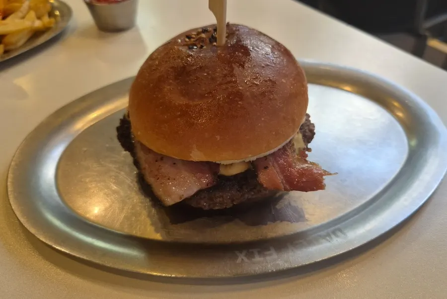 Ordered handcrafted burger and side dishes