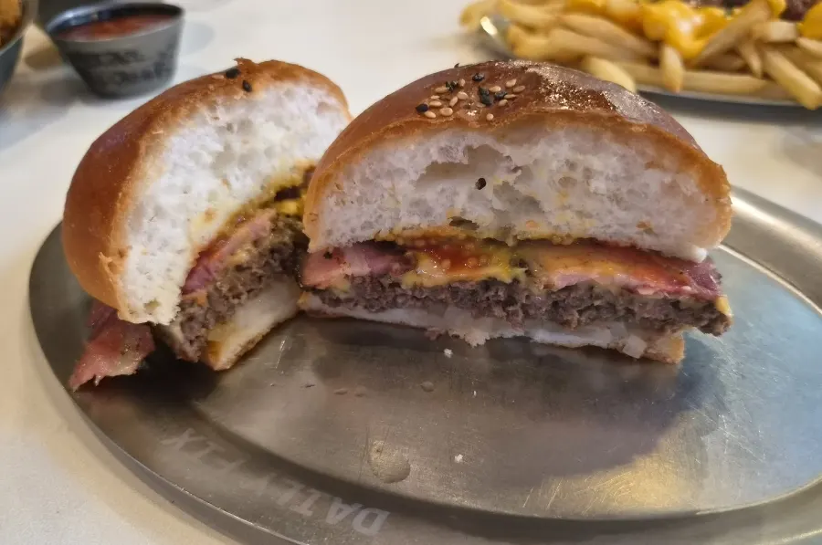 Bacon cheeseburger with a glossy bun