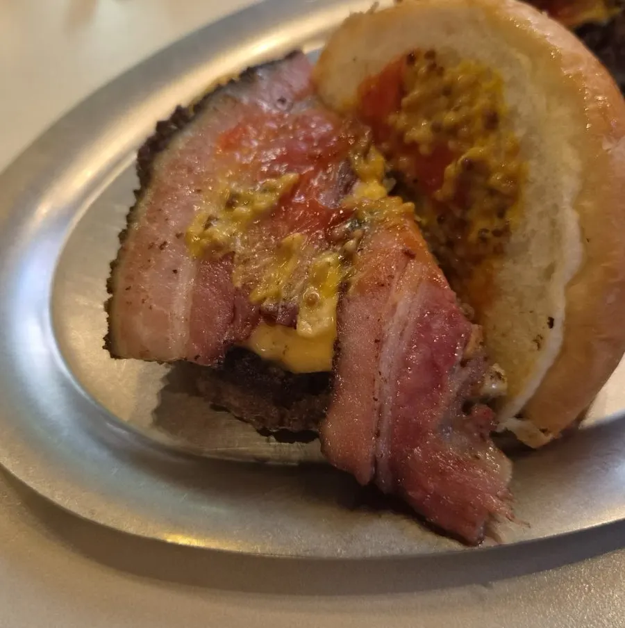 Bacon cheeseburger cross-section with thick bacon