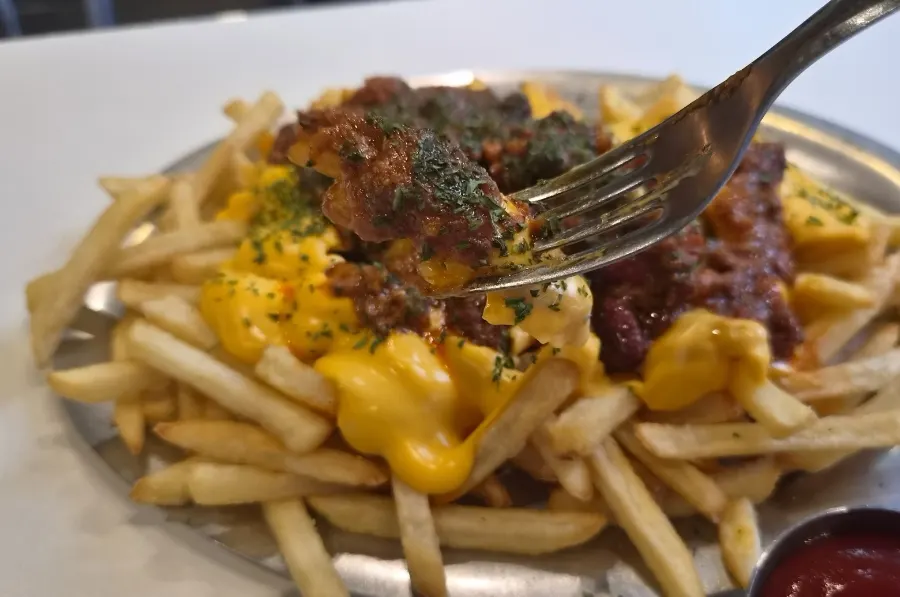 Generous portion of chili cheese fries
