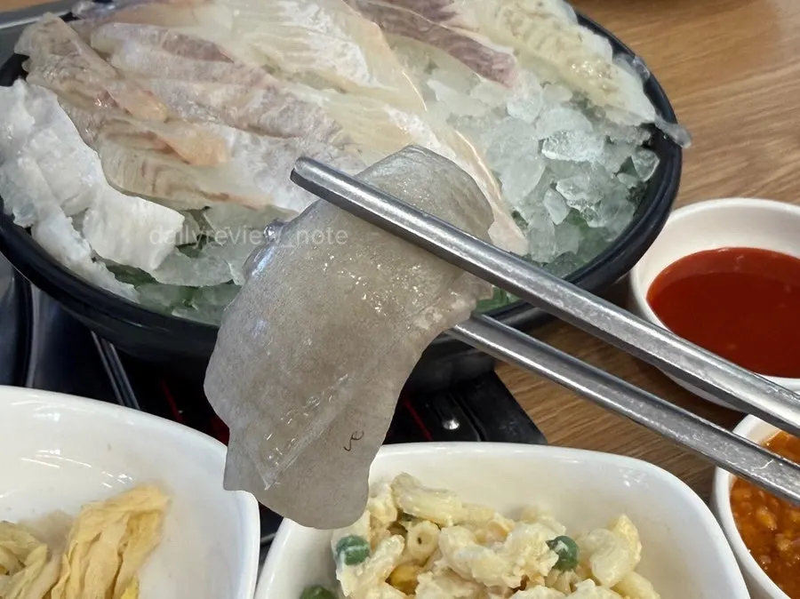 Sashimi dipped in chojang and ssamjang