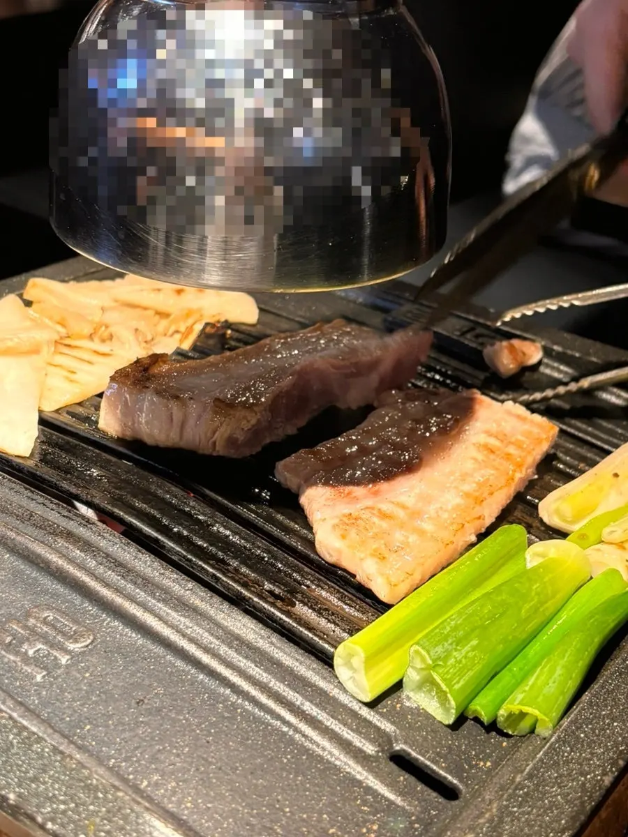 Staff grilling the galbi samgyeopsal