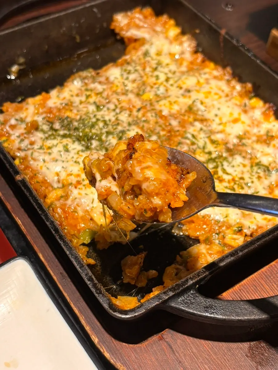 Melted cheese on top of the fried rice