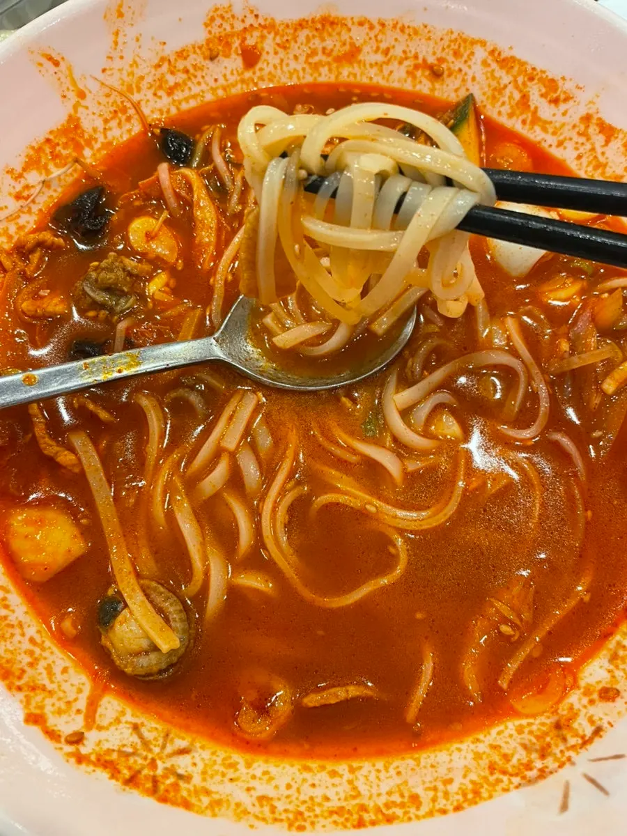 Sichuan sweet and sour pork coated in sweet-spicy sauce