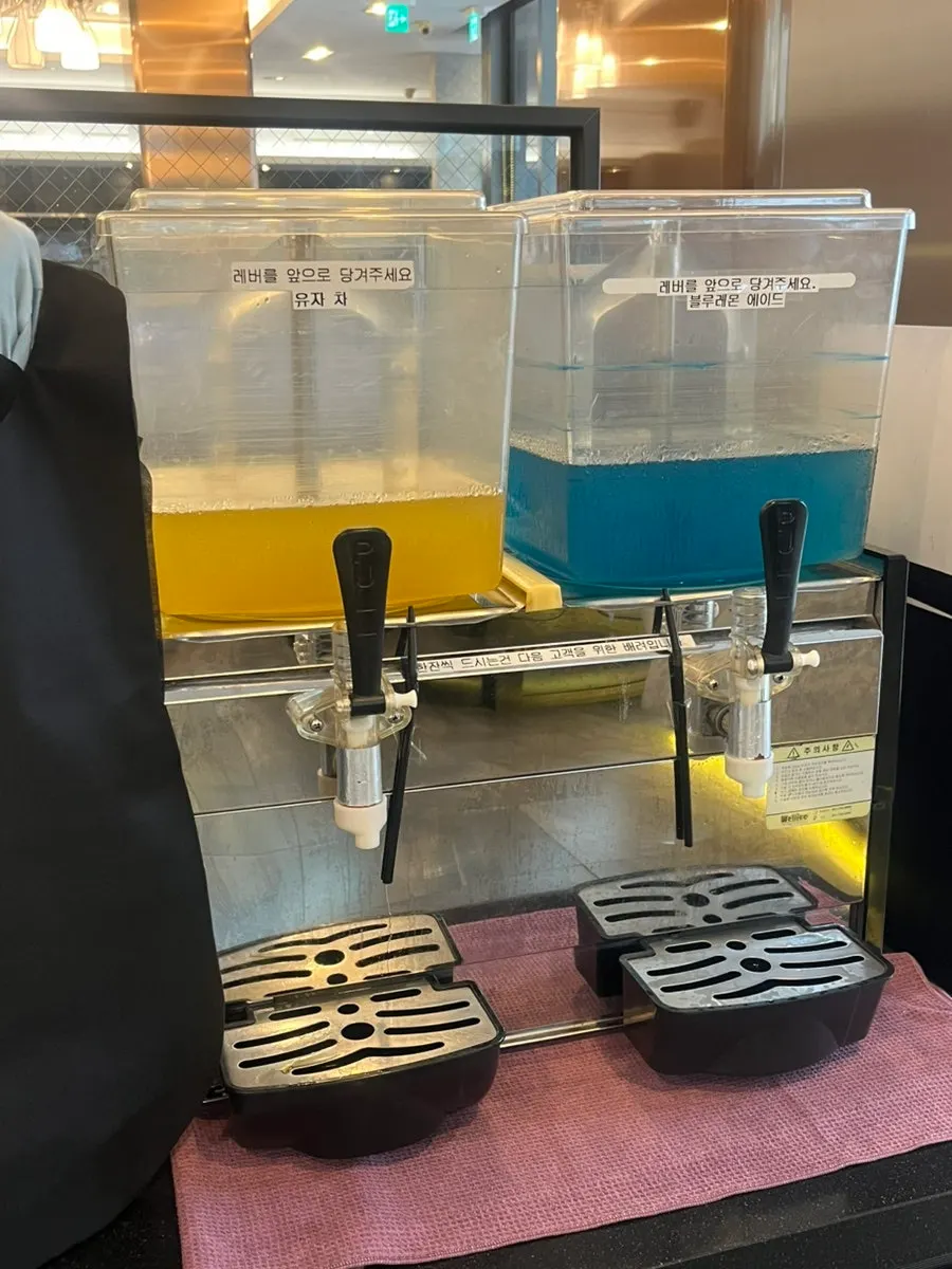 Self-serve bar with yuzu tea and blue lemonade